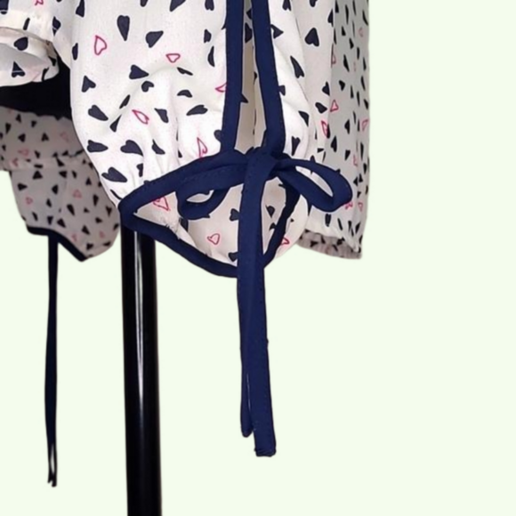 Maurices white long sleeved top with navy blue accents. Black&pink hearts. Sz. L - Picture 7 of 9